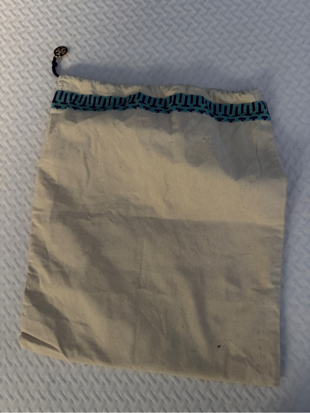 Cream Drawstring Skirt Bag with Blue Trim